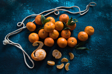 tangerines on blue background 