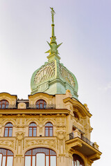 Building with a green chapel in St. Petersburg