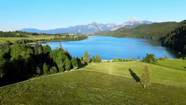 Aerial view over Lake Forggensee at the city of Fuessen in Bavaria Germany