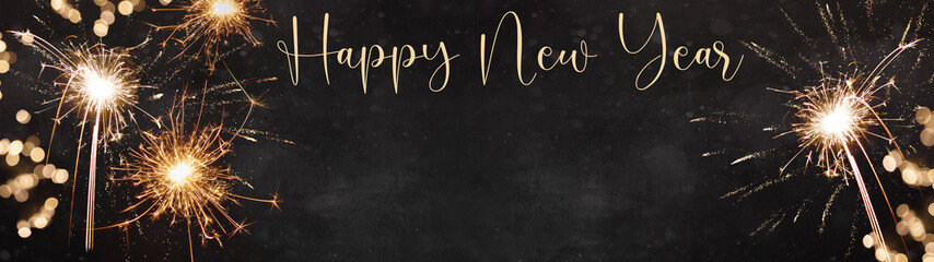Happy new year Silvester background banner panorama long- firework on rustic dark black grey stone...