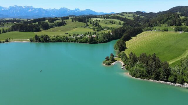 Aerial view over Lake Forggensee at the city of Fuessen in Bavaria Germany