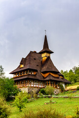 Fototapeta na wymiar Wooden churches of Maramures site, Transylvania, Romania. UNESCO World Heritage