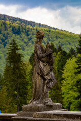 Fototapeta premium Statue at the Peles Castle, a Neo-Renaissance castle in the Carpathian Mountains, Sinaia, Prahova County, Romania