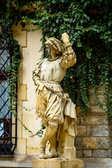 Obraz premium Lamp post at the Peles Castle, a Neo-Renaissance castle in the Carpathian Mountains, Sinaia, Prahova County, Romania