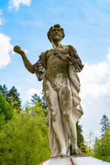 Obraz premium Statue at the Peles Castle, a Neo-Renaissance castle in the Carpathian Mountains, Sinaia, Prahova County, Romania