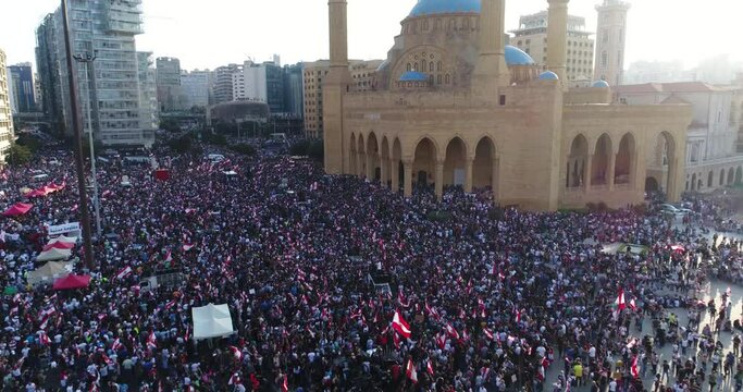 Beirut, Lebanon 2019 : day drone shot of Martyr square, during the Lebanese revolution, with thousands of protesters revolting against government failure and corruption.