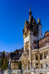 Fototapeta premium It's Peles Castle, a Neo-Renaissance castle in the Carpathian Mountains of Romania