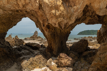 Scenic view at Ao khao kwai beach on Phayam island.  Called Hin Ta Lu  (Through rock)