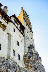It's Bran Castle (Dracula Castle) on the top of the rock, Transylvania, Bran, Romania