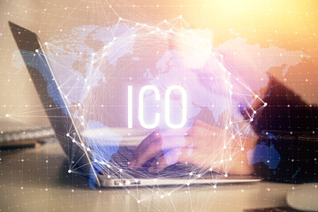 Double exposure of woman hands typing on computer and crypto market theme hologram drawing....