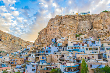 It's Ma'loula or Maaloula, a small Christian village in the Rif