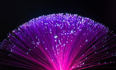 Fiber optics network cable on technology background