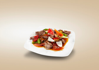 Sweet and sour meat. Sauté the meat with sauce, green peppers, red peppers, bombay, and tomatoes.