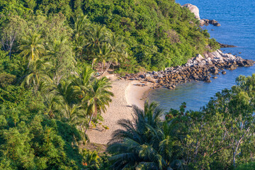 Top view on the Cu Lao Cham island near Da Nang city, Vietnam. Mountain with green trees, sandy...