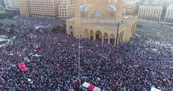 Beirut, Lebanon 2019 : day drone shot of Martyr square, during the Lebanese revolution, with thousands of protesters revolting against government failure and corruption.
