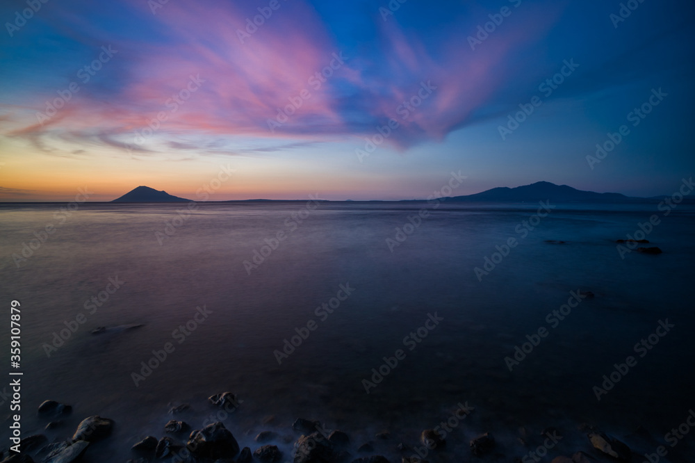 Wall mural sunset over the sea