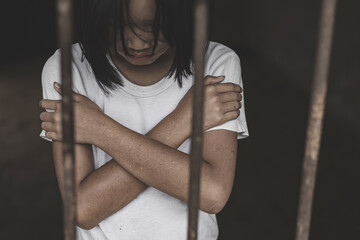 child in catch the iron prison, Human trafficking concept, human rights violations,