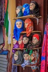 Fototapeta premium Women's head scarves on display at the market in Fes Morocco