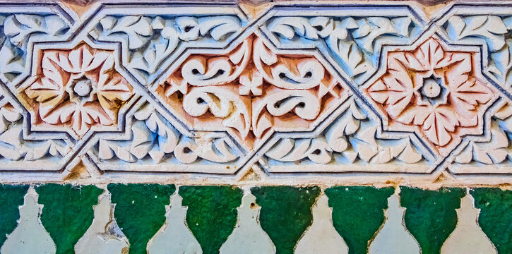 Decorative alabaster wall carvings in a Moroccan riad in Fes, Morocco