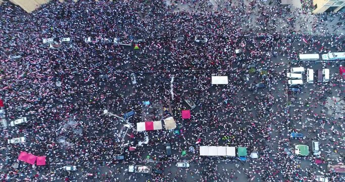 Beirut, Lebanon 2019 : day drone top shot of Martyr square, during the Lebanese revolution, with thousands of protesters revolting against government failure and corruption