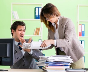 Man employee suffering from excessive work