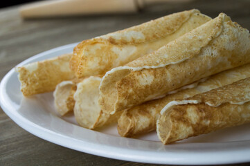 Krumkake  on a white plate