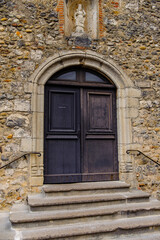 Door in Perouges, France, a medieval walled town, a popular touristic attraction.
