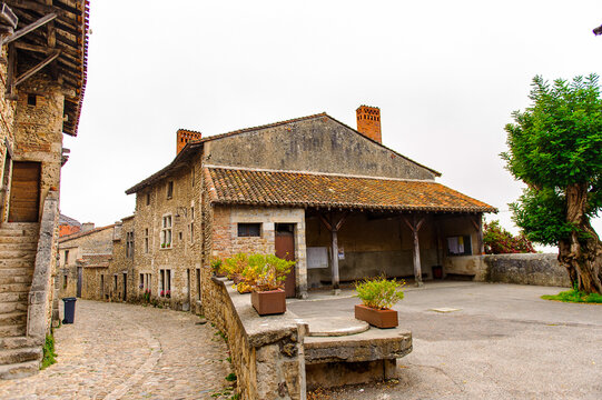 Old stone house in  Perouges, France, a medieval walled town, a popular touristic attraction.