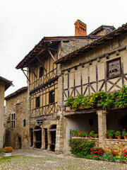 Architecture of the main square Perouges, France, a medieval walled town, a popular touristic attraction.