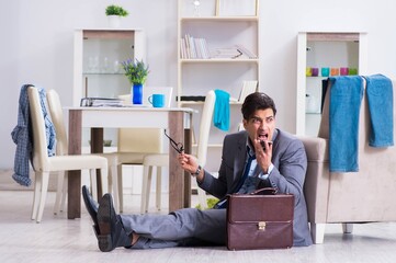 Businessman late for office due to oversleeping after overnight