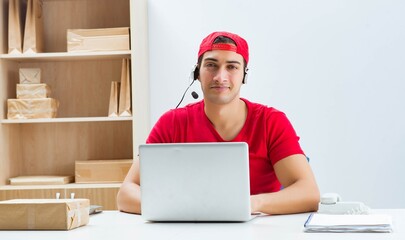 Call center worker at parcel distribution center in post office