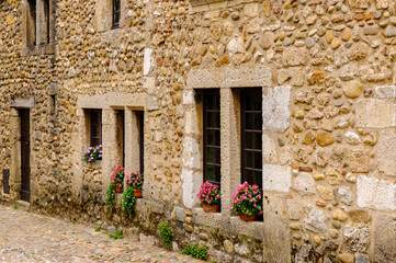 Fototapeta na wymiar Old house of Perouges, France, a medieval walled town, a popular touristic attraction.