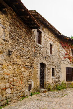 Close view of the authentic stone house of Perouges, France, a medieval walled town, a popular touristic attraction.
