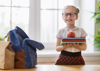 child preparing for school