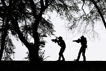 Shadow of a soldier, army, marines, team in military operations