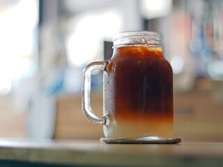 Ice coffee, americano coffee with lychee in cafe.