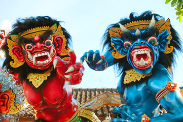 Red and Blue Ogoh Ogoh for Bali's New Year called Nyepi in Bali, Indonesia