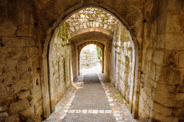 Fototapeta na wymiar It's Old medieval passage of Saint Paul de Vence, France