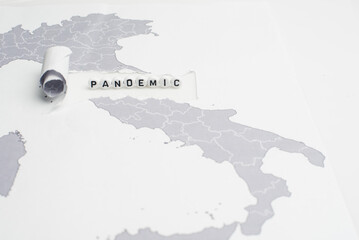 The word pandemic over world map,selective focus