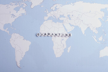 The word Quarantine on a world map