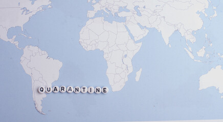 The word Quarantine on a world map