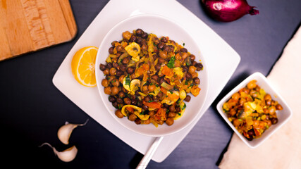 Top Down photo of Chickpea salad with Lemon, Onion and garlic clove