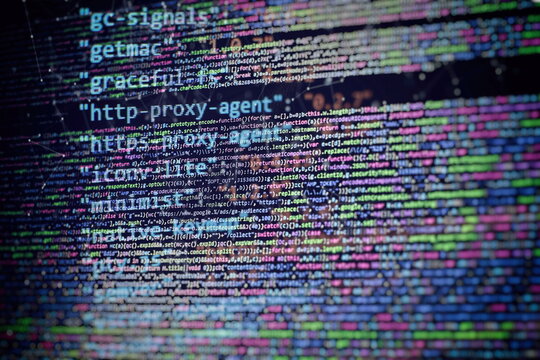 CSS, JavaScript and HTML usage. Monitor closeup of function source code. Abstract IT technology background. Software source code.