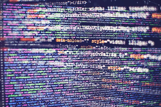 CSS, JavaScript and HTML usage. Monitor closeup of function source code. Abstract IT technology background. Software source code.