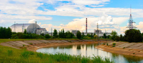 Fototapeta premium New Safe Confinement (NSC or Shelter), a structure built to contain the remains of 4th reactor unit at the Chernobyl Nuclear Power Plant Ukraine