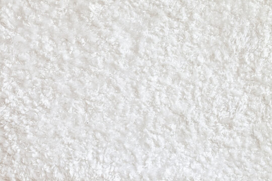 White Fluffy Carpet Texture. Soft Luxury Shag Rug. Short Shag Carpet Surface. Domextic High-density White Rug.