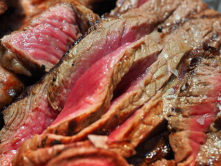 Delicious steak cooked on the grill. Meat cooked to perfection. Red meat