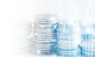 3D Rendering of stock candle charts with bokeh lights overlay of stack of coins. For business finance background