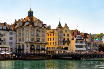 Fototapeta na wymiar Architecture on the river Reuss in Lucerne, a city in the German-speaking part of Switzerland