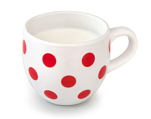 Typical cup of milk. White porcelain cup with red dots filled with milk. Dotted cupful with milky. Isolated on white background with shadow reflection.